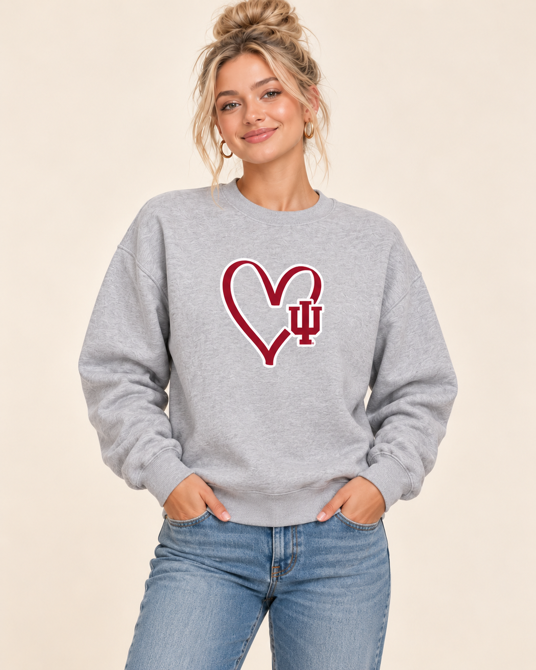 Woman wearing IU Outline Heart design on Sport Gray crewneck