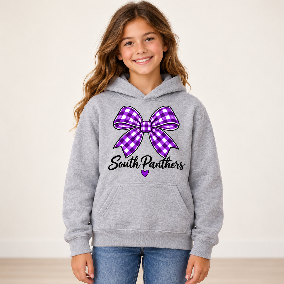 Model wearing South Panthers Bow Youth Hoodie in Sport Gray