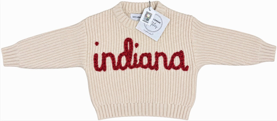 Cream infant and toddler knit sweater with hand-stitched red Indiana lettering