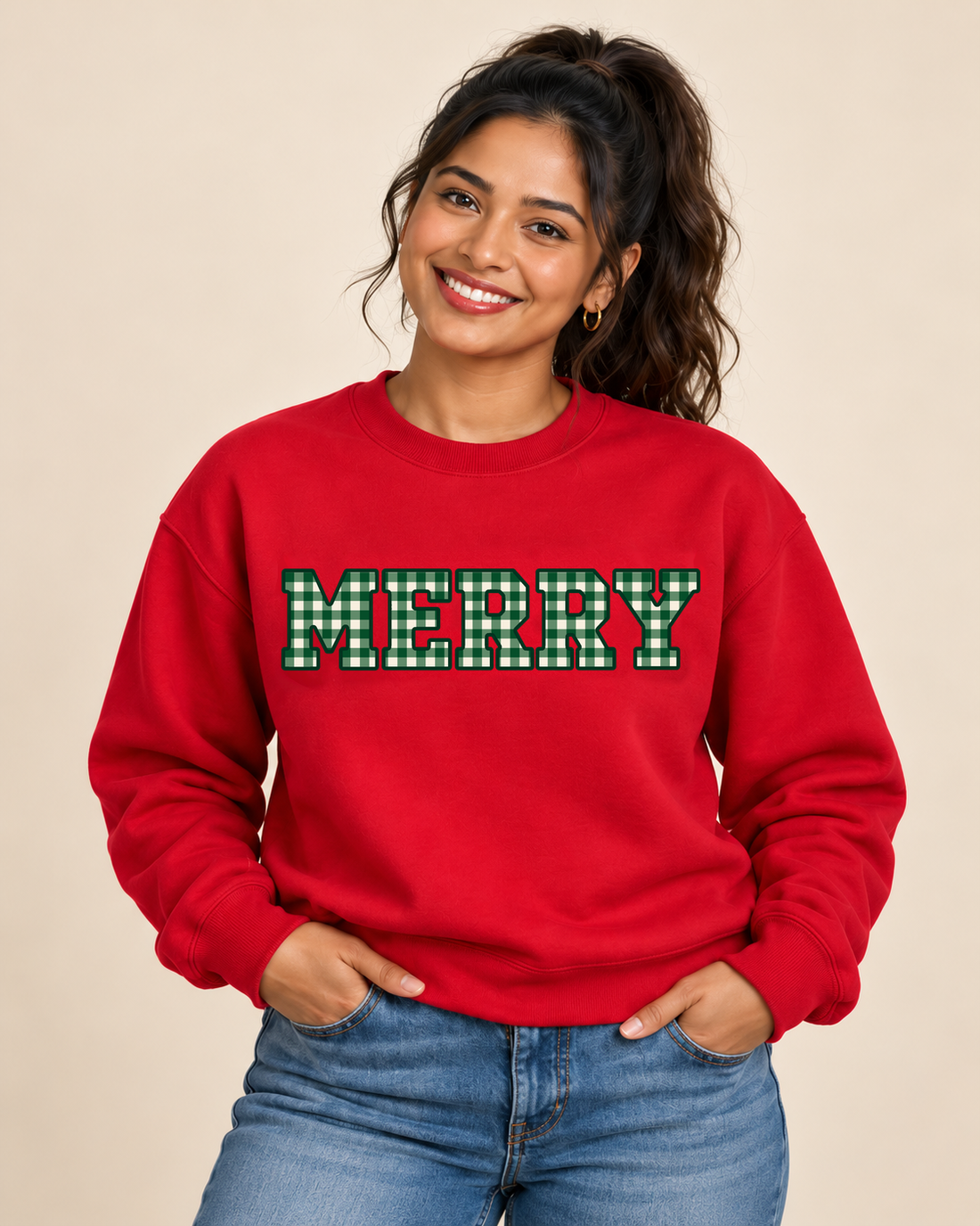 Illustrative model mockup of MERRY Green Gingham crewneck in Cherry Red with approved square-grid artwork