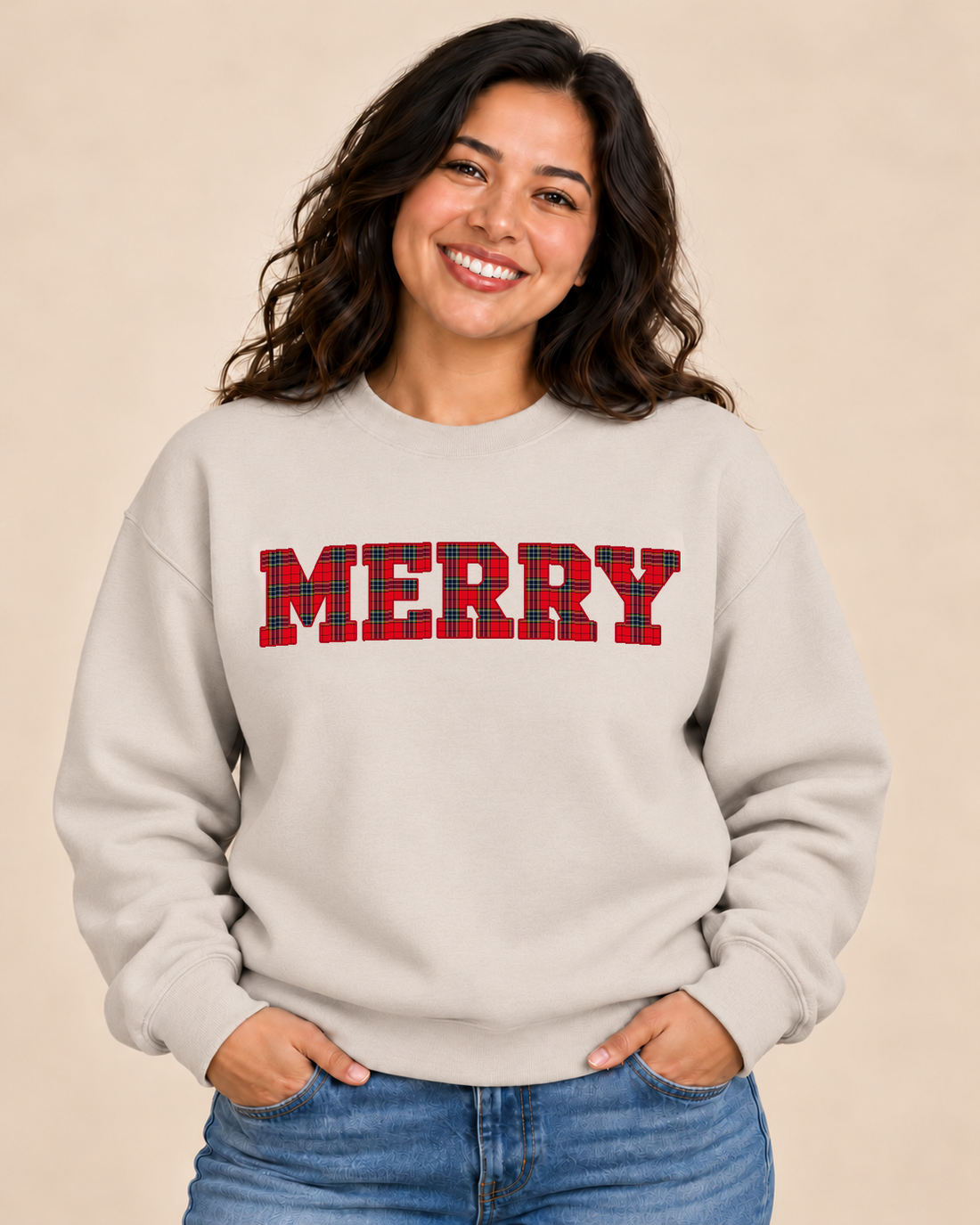 Illustrative mockup of MERRY Royal Stewart Plaid crewneck in Natural, with the approved smaller plaid artwork